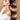 Woman with long, full Chocolate Dark Brown & Light Brown Caramel hair from invisible tape-ins – Rubin Extensions®