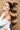 Woman with long, full Chocolate Dark Brown & Light Brown Caramel hair from invisible tape-ins – Rubin Extensions®