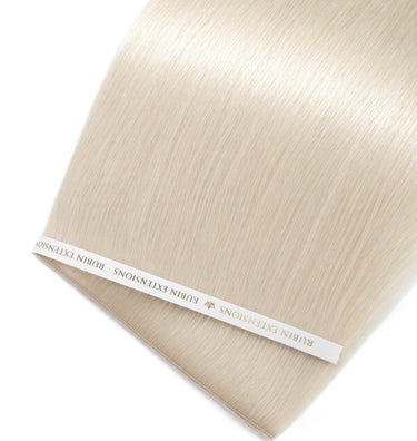 Close-up of icy blonde human hair strands, Platinum Blonde Genius Weft – Rubin Extensions®